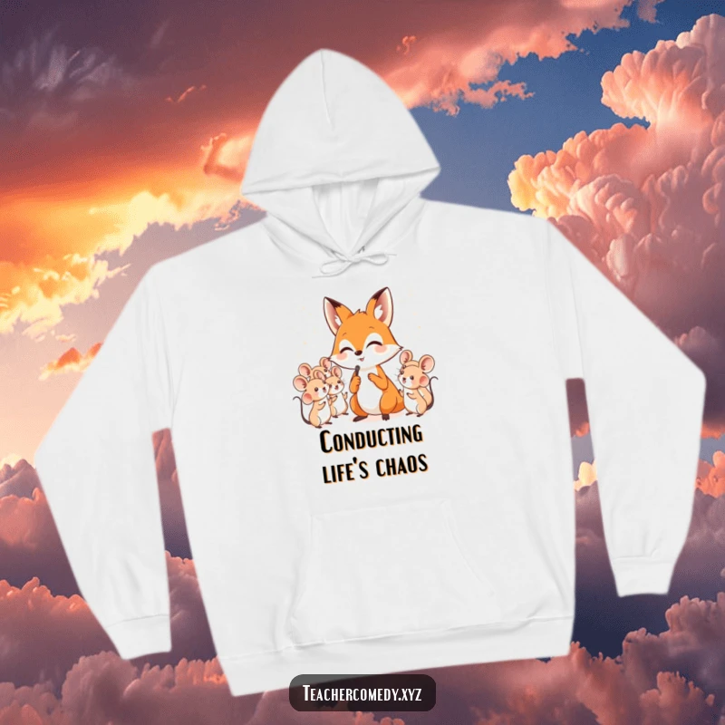 Funny hoodie depicting a clever fox passionately directing a choir of happy, singing mice, perfect for cozy, humorous comfort.
