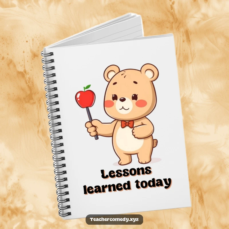 Funny bear character notebook, with a bear pointing at an apple on the cover, perfect for taking notes.
