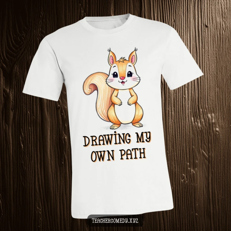 Funny t-shirt featuring a playful squirrel focused on drawing with a crayon on a large piece of paper, showcasing artistic humor.