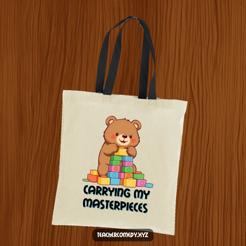 Funny bear tote bag with a determined bear building a tower of colorful blocks, a humorous and practical accessory.